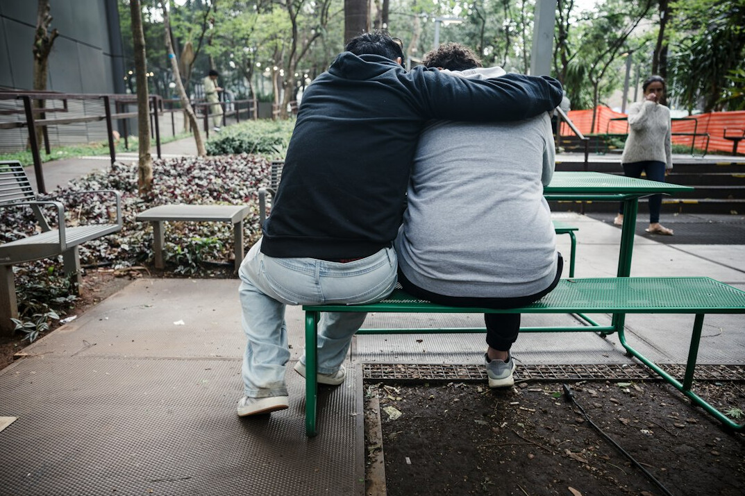 celebrity couple hugging in public