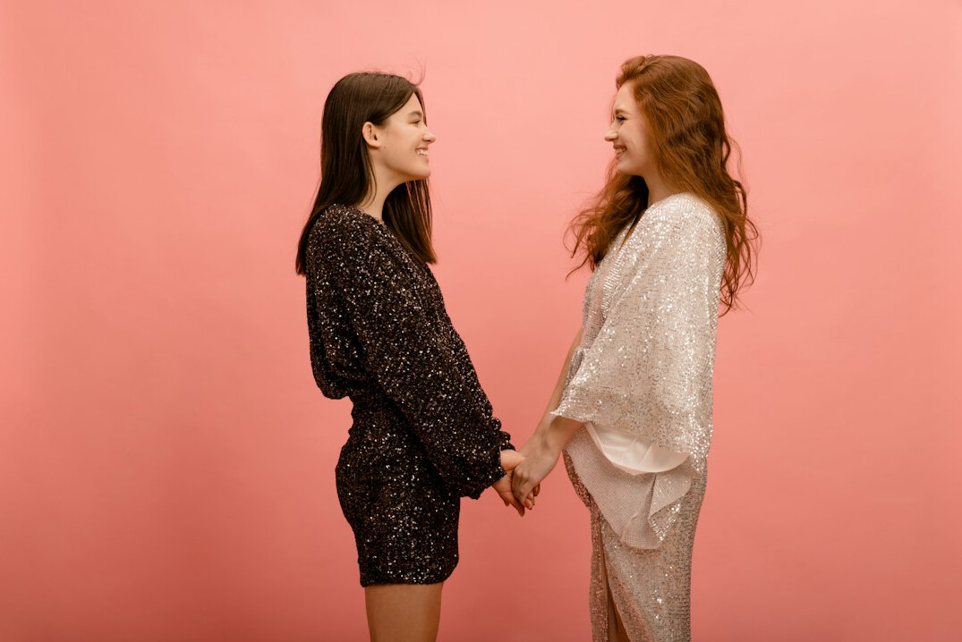 two celebrities talking