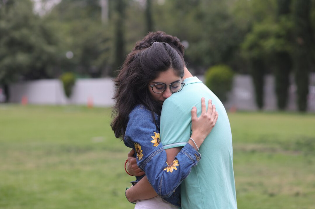celebrities hugging after scandal
